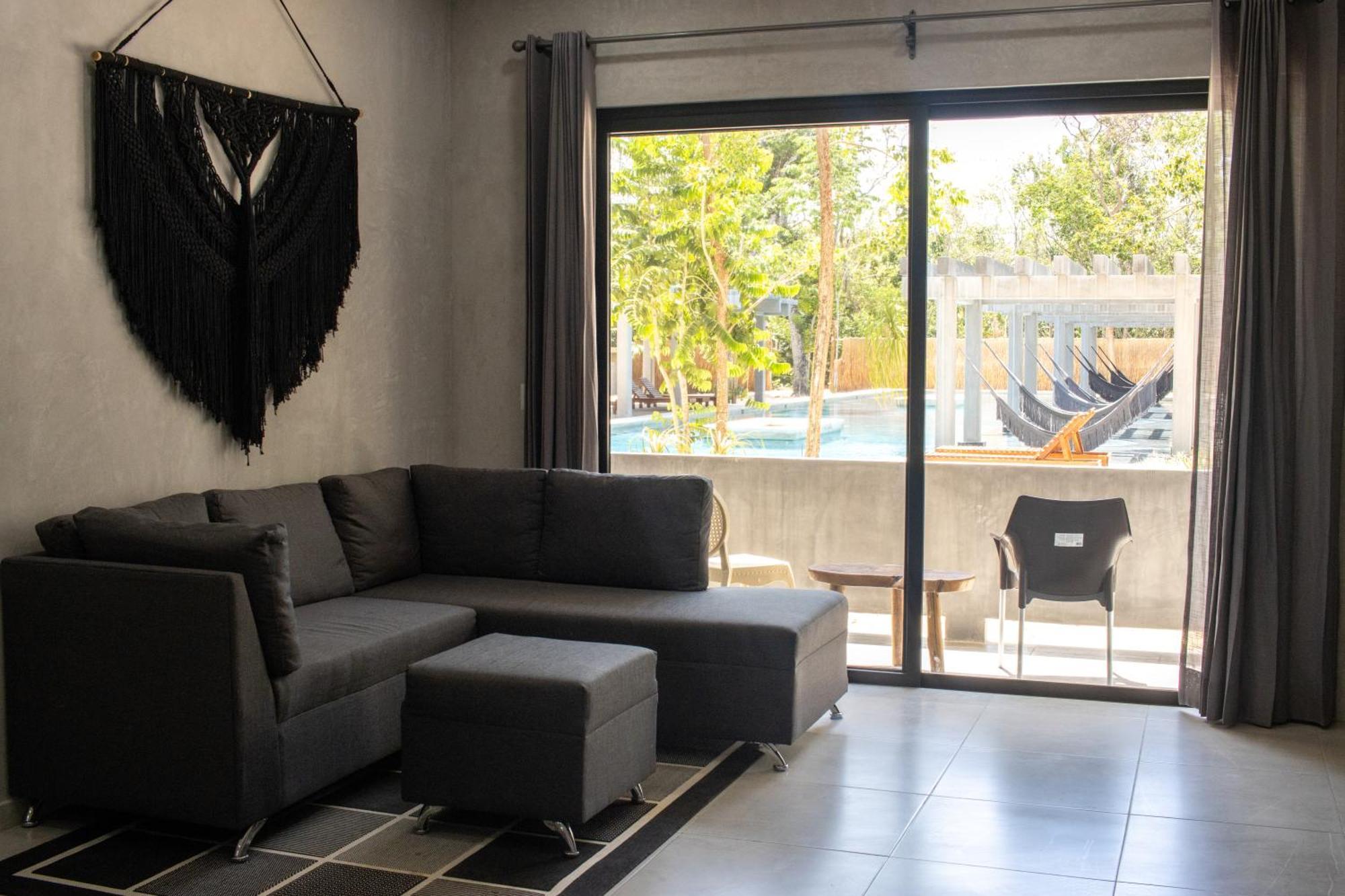Hotel Casa Tortuga Tulum - Cenotes Park Inclusive Екстер'єр фото A living room with a sofa